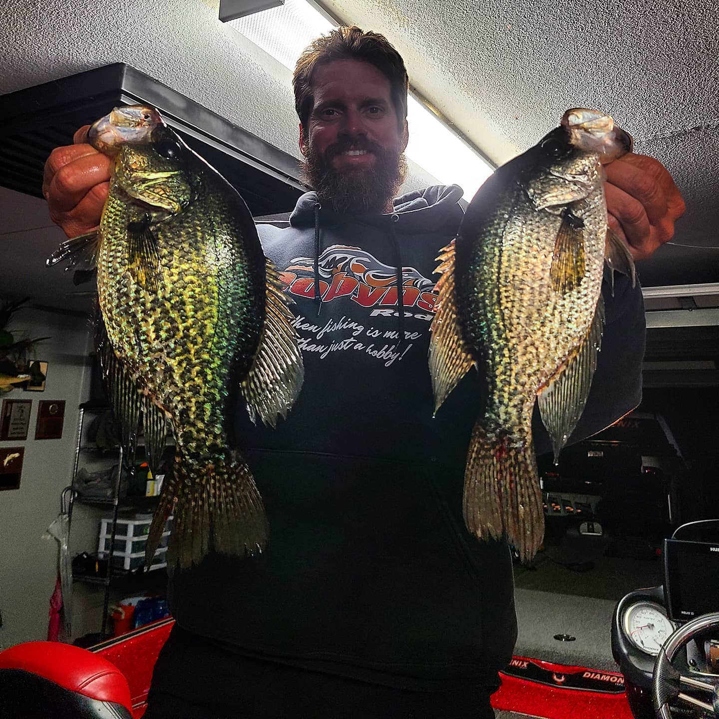 Erik Tilson with two giant Speckled Perch