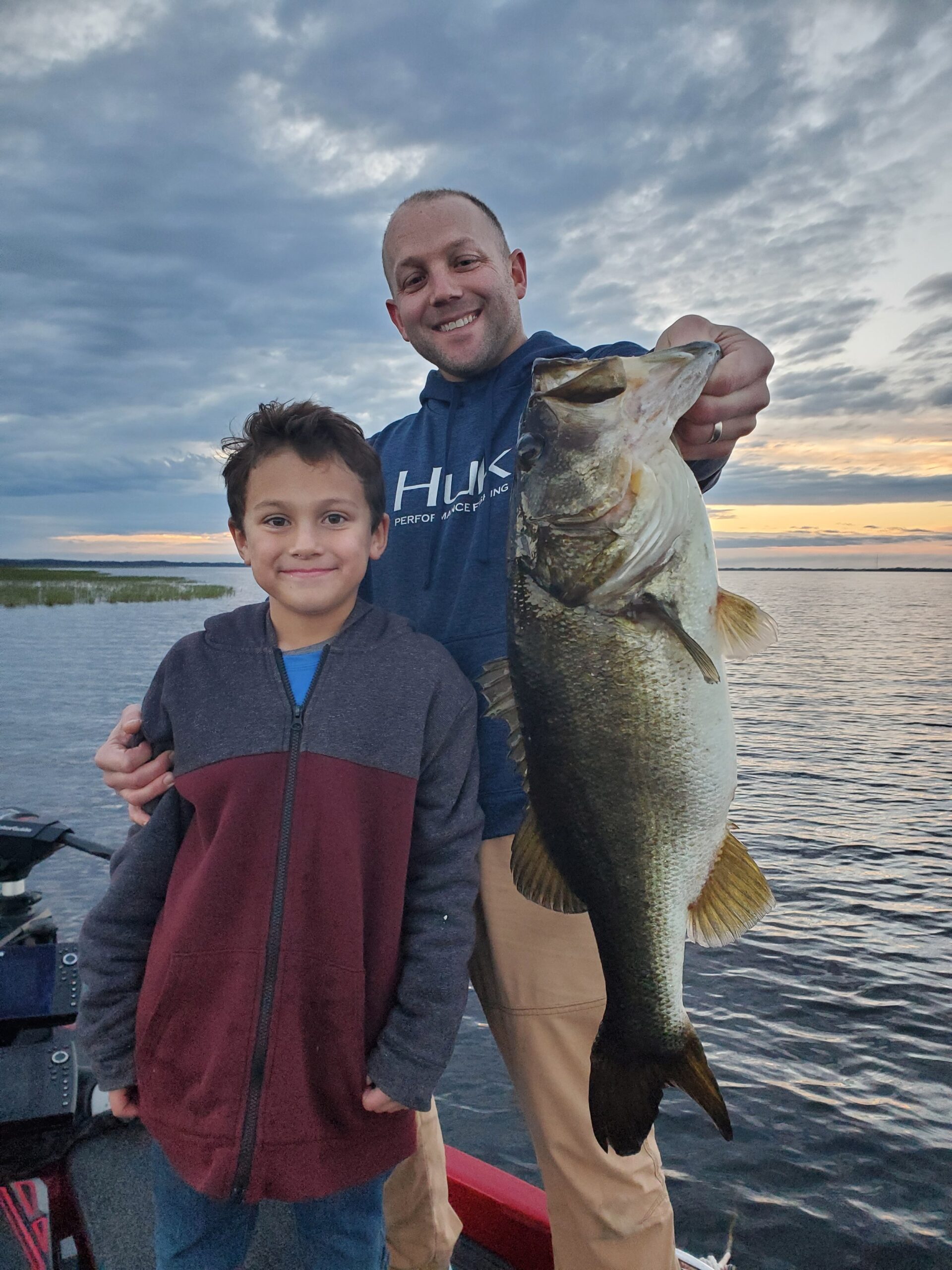 Father son with a big bass